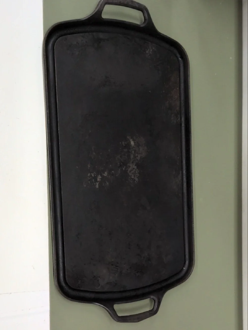 Field Company Long Cast Iron Griddle features a vintage-style .